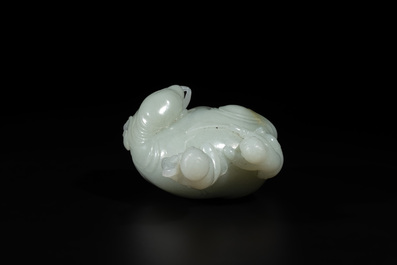 A Chinese celadon jade group of two boys cleansing an elephant, 18th C.
