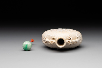 A rare Chinese monochrome ge-type 'chilong' snuff bottle with jadeite stopper, Qianlong mark and of the period