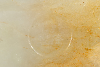 A Chinese white jade 'dragon' ink container with Qianlong mark and possibly of the period