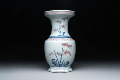 A fine Chinese blue, white and copper-red 'magpie and pine tree' vase, Yongzheng/Qianlong