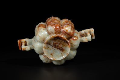 A Chinese celadon and russet jade wedding cup, 18th C.