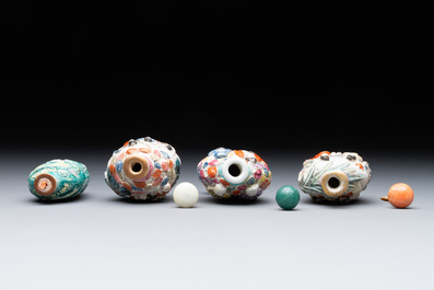 Eight Chinese moulded famille rose snuff bottles, Qianlong mark, 19th C.