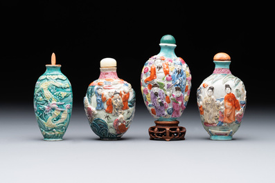 Eight Chinese moulded famille rose snuff bottles, Qianlong mark, 19th C.