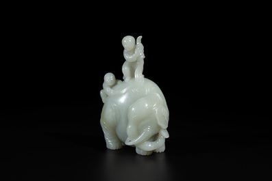 A Chinese celadon jade group of two boys cleansing an elephant, 18th C.