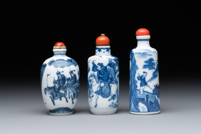 Two Chinese blue and white snuff bottles and a blue, white and copper-red snuff bottle, Yongzheng mark, 19th C.