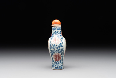A Chinese blue, white and copper-red snuff 'deer' bottle, Yongzheng mark and of the period