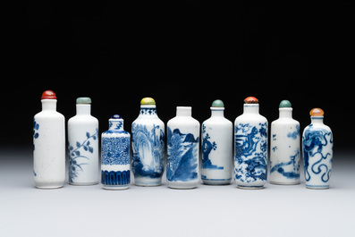 Nine Chinese blue and white snuff bottles, Kangxi and Qianlong mark, 19th C.