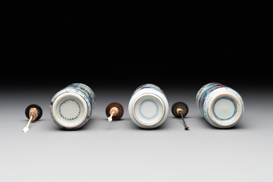 Three Chinese blue, white and copper-red snuff bottles, 19th C.