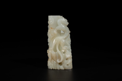 A Chinese white jade 'dragon' ink container with Qianlong mark and possibly of the period