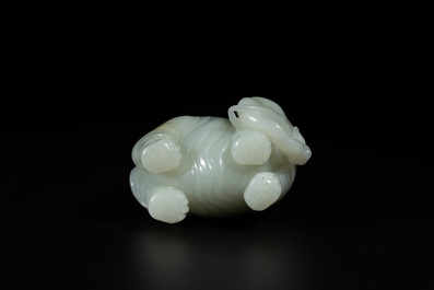 A Chinese celadon jade group of two boys cleansing an elephant, 18th C.