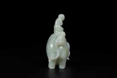 A Chinese celadon jade group of two boys cleansing an elephant, 18th C.