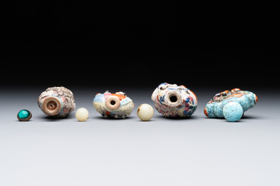 Eight Chinese moulded famille rose snuff bottles, Qianlong mark, 19th C.