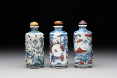 Three Chinese blue, white and copper-red snuff bottles, 19th C.