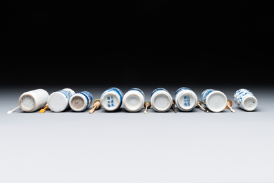 Nine Chinese blue and white snuff bottles, Kangxi and Qianlong mark, 19th C.