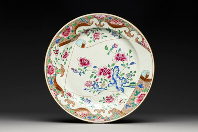 A Chinese famille rose dish and four plates with floral design, Qianlong