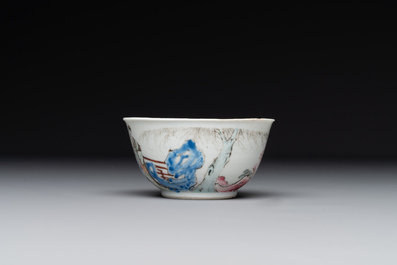 A Chinese famille rose cup and saucer with music making ladies, Yongzheng/Qianlong
