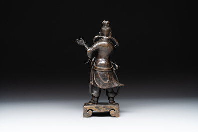 A fine Chinese bronze figure of a divinity, Ming