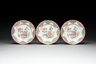 Two sets of six Chinese famille rose plates with peonies, Yongzheng/Qianlong