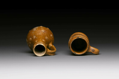 Five stoneware mugs and jugs with various seals, Germany, 16/17th C.