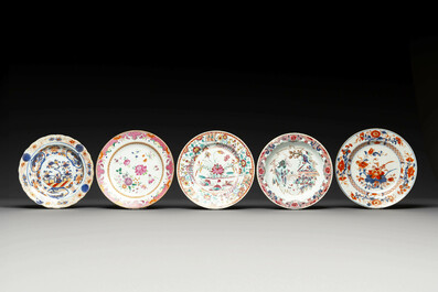 A group of thirteen Chinese blue, white and famille rose plates and a bowl, late Ming/early Qing