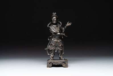 A fine Chinese bronze figure of a divinity, Ming