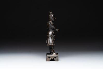 A fine Chinese bronze figure of a divinity, Ming