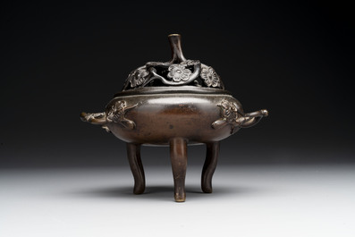 Two Chinese Chinese bronze cylindrical incense stick holders and a covered censer, Yuan/Ming and Qing