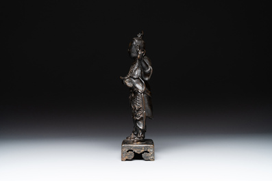 A fine Chinese bronze figure of a divinity, Ming