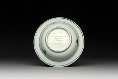 A group of thirteen Chinese blue, white and famille rose plates and a bowl, late Ming/early Qing