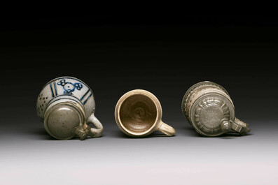 Five stoneware mugs and jugs with various seals, Germany, 16/17th C.