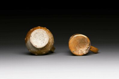 Five stoneware mugs and jugs with various seals, Germany, 16/17th C.