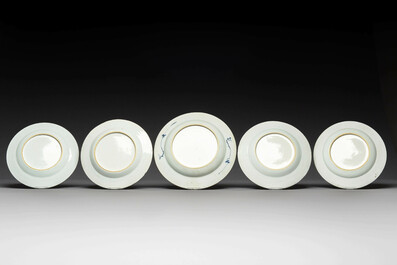 A group of thirteen Chinese blue, white and famille rose plates and a bowl, late Ming/early Qing
