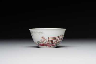 A Chinese famille rose cup and saucer with music making ladies, Yongzheng/Qianlong