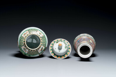 A Chinese famille verte covered vase and a bottle vase, 19th C.