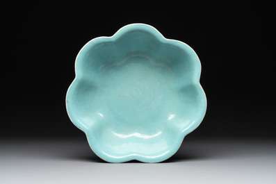 A set of 14 Chinese turquoise-ground famille rose dinner service, Qianglong mark, 19th C.