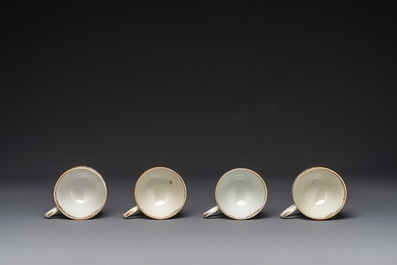 Four Chinese famille rose cups and saucers and a sugar bowl with design of two horses, Qianlong