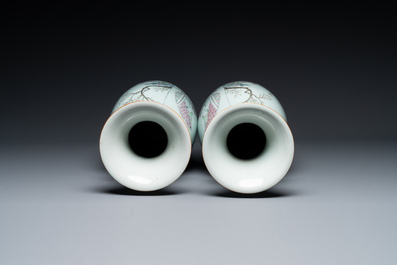 A pair of Chinese famille rose vases with ladies in a garden, signed Rongfang, 19/20th C.