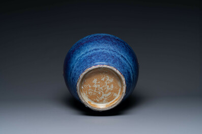 A large Chinese flamb&eacute; glaze 'hu' vase with Taotie handles, Qing