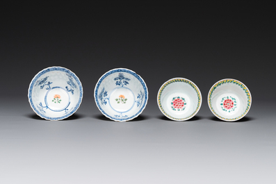 A pair of Chinese famille verte and a pair of famille rose cups and saucers, Kangxi/Yongzheng