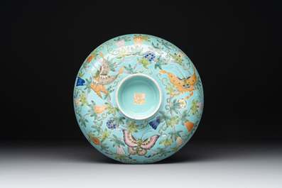 A set of 14 Chinese turquoise-ground famille rose dinner service, Qianglong mark, 19th C.