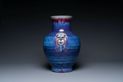 A large Chinese flamb&eacute; glaze 'hu' vase with Taotie handles, Qing