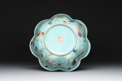 A set of 14 Chinese turquoise-ground famille rose dinner service, Qianglong mark, 19th C.
