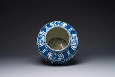 A Chinese blue and white jar and cover with floral design, Wanli