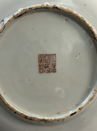 A pair of Chinese famille rose 'rice production' plates, Daoguang mark, 20th C.