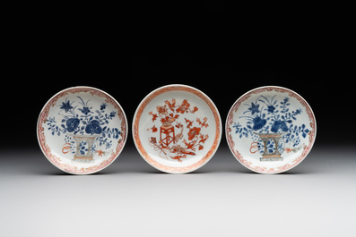 A pair of Chinese polychrome-decorated cups and saucers and an iron-red gilt-decorated cup and saucer, Yongzheng/Qianlong