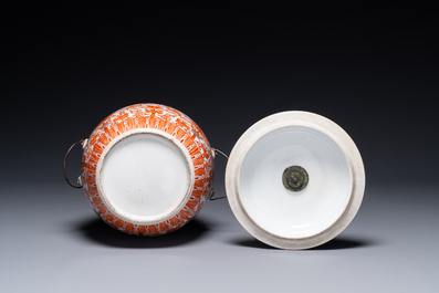A Chinese iron-red-decorated covered bowl and a famille rose covered bowl, 19th C.
