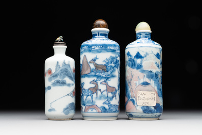 Three Chinese blue, white and copper-red snuff bottles, Yongzheng mark, 19/20th C.
