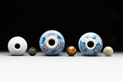 Three Chinese blue, white and copper-red snuff bottles, Yongzheng mark, 19/20th C.