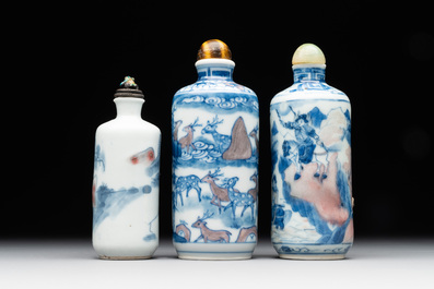 Three Chinese blue, white and copper-red snuff bottles, Yongzheng mark, 19/20th C.