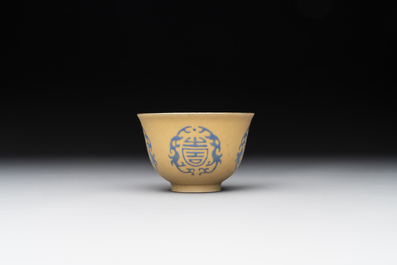 A Chinese blue enamel on gilt &lsquo;Shou&rsquo; cup, 19th C.